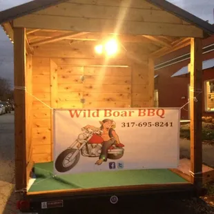 Watch for the cabin with the blue roof! Follow us on Facebook and Twitter, and come try our smoked goodness!