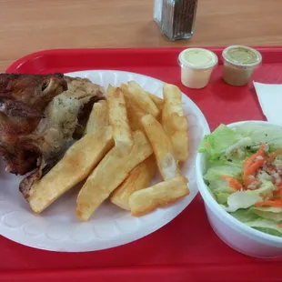 1/4 chicken with salad and yucca.