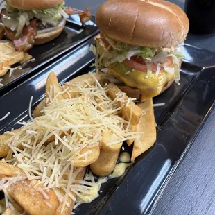 two sliders with cheese and lettuce