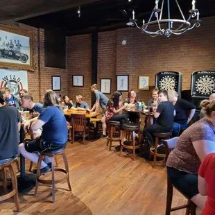 a large group of people sitting at tables