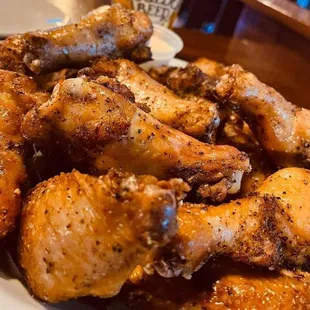 a plate of chicken wings