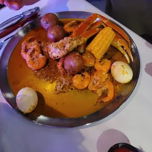 Not the best photo. But if only you could taste the food. Seafood Boil with crab legs and shrimp and boiled egg.