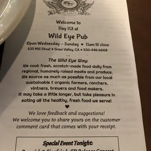 a menu and a plate of food