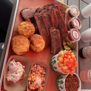 Ribs, Meaty Beans, Mac N Cheese, Brisket, Tri Tip and some Amazing Sauces.... Pickles and Sausage are Must Haves!