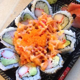 Volcano roll on the cutest takeout container I've ever seen.