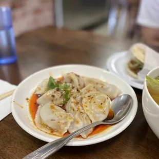 D1. Pork Dumplings in Sauce