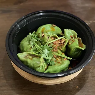 D3. Spinach Dumplings in Sauce