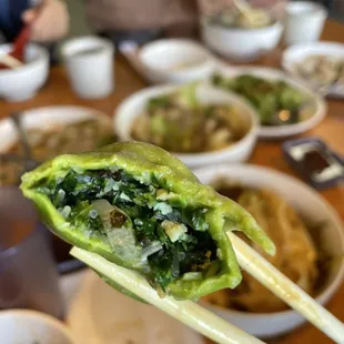 D3. Spinach Dumplings in Sauce cross section