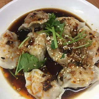 D1. Pork Dumplings in Sauce