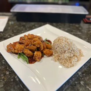 General Tso with green beans and brown rice.