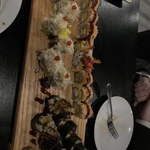 a long wooden platter of food