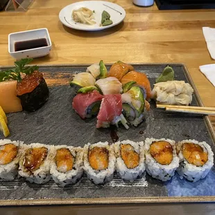 Rainbow roll. Salmon pâté roll ikura ( salmon egg). Salmon sashimi