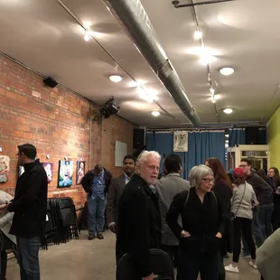 After the event was over, chairs were quickly stacked and moved out of the way for guests to mingle.
