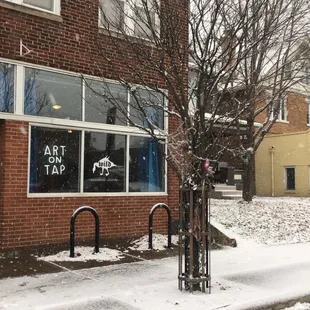 Front entrance with public art and beginning of yarn bombing.