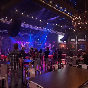 a crowd of people at a bar