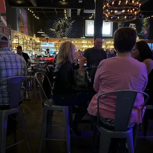 a group of people sitting at a table