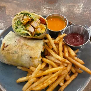 Buffalo chicken Caesar wrap with fries
