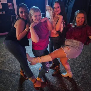 a group of women posing for a picture