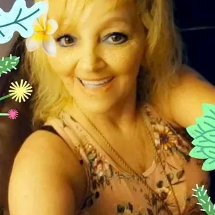 a woman with a flower in her hair