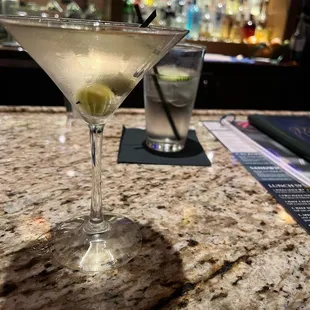 a martini with olives in it