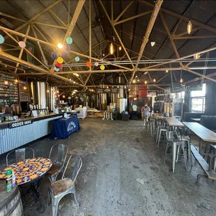 Taproom in view of brew tanks