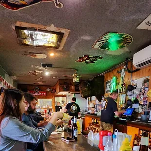 people sitting at a bar