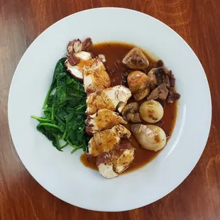 We make specialty dishes for our special customers! This one is called Coq Au Vin, a french dish!