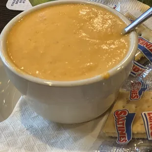 a bowl of soup and crackers