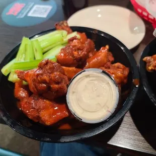 Wings with Mike&apos;s Mix Extra Hot Sauce. Also absolutely delicious.