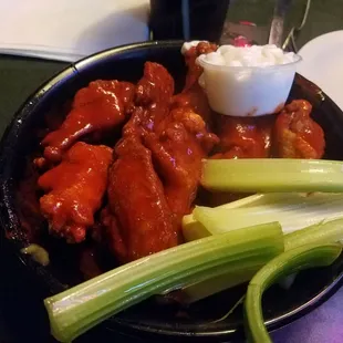 Their delicious buffalo wings and awesome housemade bleu cheese.