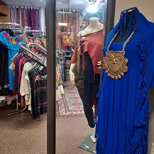 Forefront, electric blue Magic dress (can be worn at least 5 different ways) is hand woven 60% cotton and 40% rayon from Morocco.