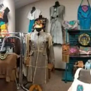 Handmade and hand embroidered Huipiles on the left, lamb suede Ponchitas next -- W!ld  Moon Leather Couture, far right.