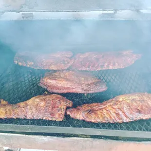 meat cooking on a grill