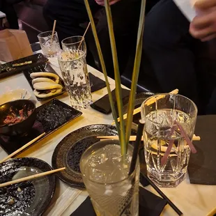 Some ginger cocktail with lemongrass.  Simple and so pretty.  Pupus in the background...