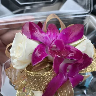 2 spray roses and 2 orchids corsage $48