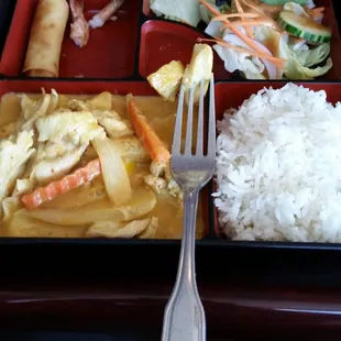 Yellow Curry with White Rice, Siam Rolls, and side salad.