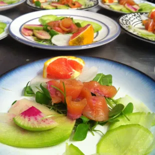 a variety of salads on plates