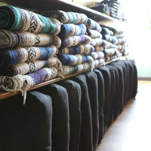 We all the props you could need. Blankets, bolsters, blocks, straps, and eye pillows. Your teacher will let you know what props you need!