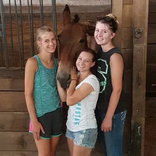 Employees bonding with the new mule!
