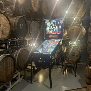 Pin ball machine and wine barrels
