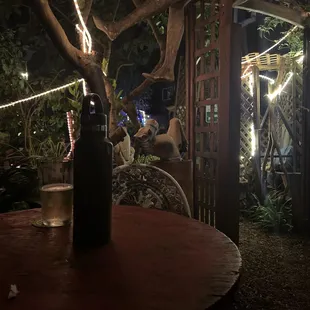 Back yard located downstairs from the bar pass another seating area. Very quiet with conversations of joy.