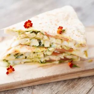 a close up of a sandwich on a cutting board