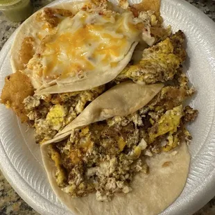 Chorizo and egg and migas taco on the top...