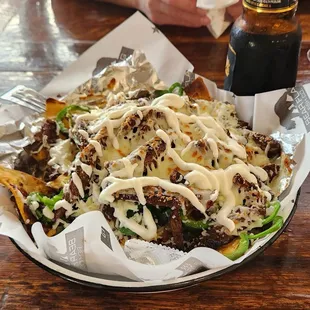 Borracho Nachos with no pico de gallo. Yummy blend of crispy and savory. Meat was super tender and beans were amazing!