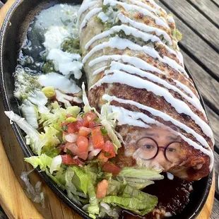 a plate of food on a wooden table