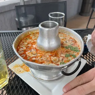 a bowl of soup on a table