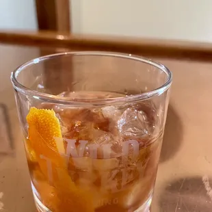 a drink in a glass on a table