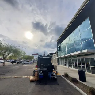 a truck parked in front of a building