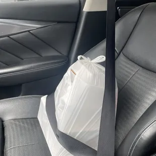 Bag secured 2 (10 pc) hot lemon pepper and lemon pepper wet a order of mozzarella sticks and a small order of fries