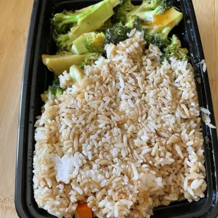 rice, broccoli, and carrots in a plastic container